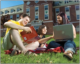 Students on the lawn outside of the Harriet Irving Library