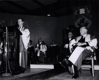 Lord Beaverbrook seated an graduation ceremony