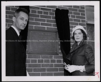 Colin Mackay and Lady Jean Campbell unveil the Aitken House plaque, May 1958. UA PC-4 no. 7d (1). Photo credit: Harvey Studios Ltd.