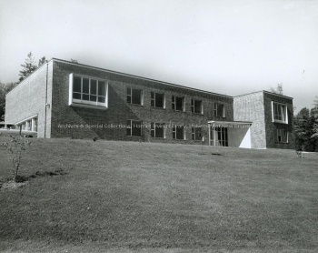 Uphill view of Alumni Memorial Building, [after 1955]. UA PC 9 no. 53 (1).