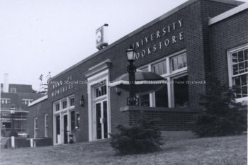 Bank and bookstore, [between 1963 and 1966]. UA PC 9a no. 14 (1).