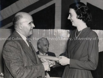 Dr. A. F. Baird and Helen J. Baxter shaking hands, (ca.1947). UA PC 13; no. 5. Photo credit: L. Harrison.