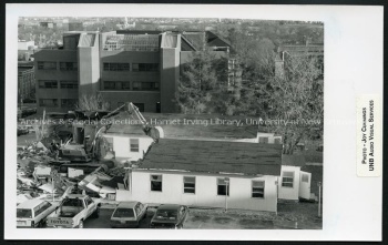 The demolition of 1960s era huts, 1993. PR; Series 2; Sub-series 1; File 135; Item 8. Photo credit: Joy Cummings-Dickenson.