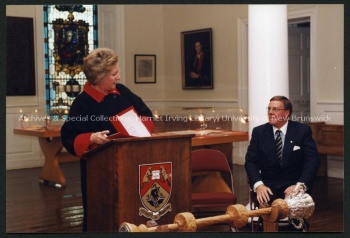 UNB President Elizabeth Parr-Johnston and  Chancellor Fredrik S. Eaton in Sir Howard Douglas Hall with UNB mace in foreground, October 1999. PR; Series 2; Sub-series 4; File 820; Item 13.