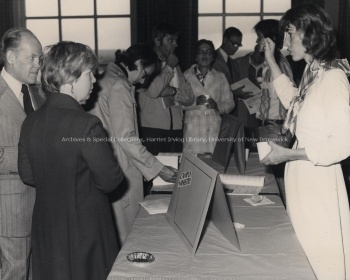 Mrs. and Mr. Stan Carric of Pt. Clair, Quebec with Mary Lou McGibbon of Campus Ministry during the 1976 Orientation. PR; Series 1; Sub-series 7; Item 7702.