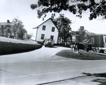 Neville farmhouse being moved across the street, 1969. UA PC 9 no. 16 (5). Photo credit: Joe Stone & Son Ltd.