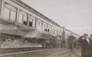 Train decorated with bunting taking UNB students to a rugby game at Mount Allison University. UA PC 16; no. 99 (2).