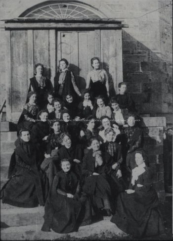 Women of UNB seated on the steps of the Old Arts Building, March 1900. PR; Series 1; Sub-series 5; Item 6662. Photo credit: Ira Brown.